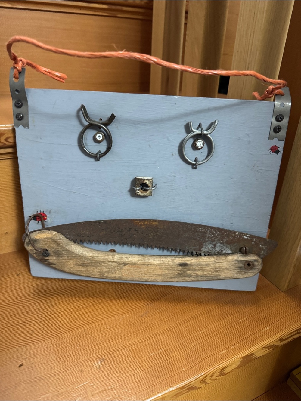 Rustic Redneck Wall Display with Reclaimed Saw & other metal items